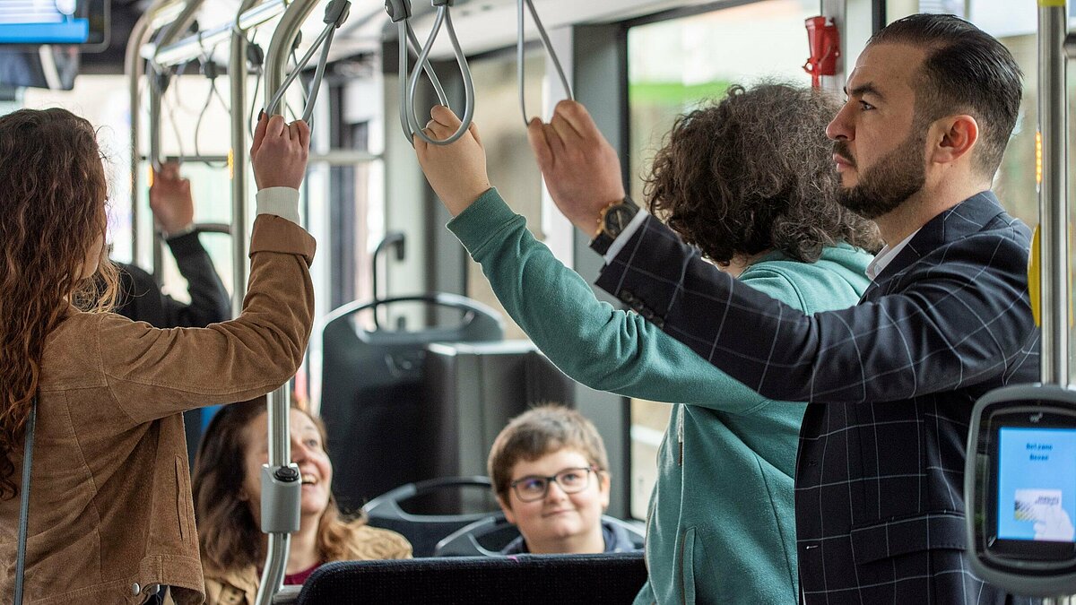 Some passengers in the bus