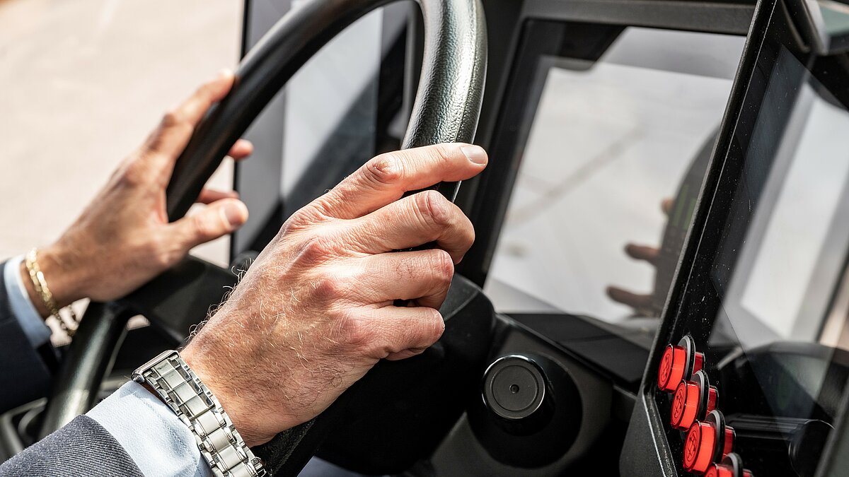 Bus driver at the wheel